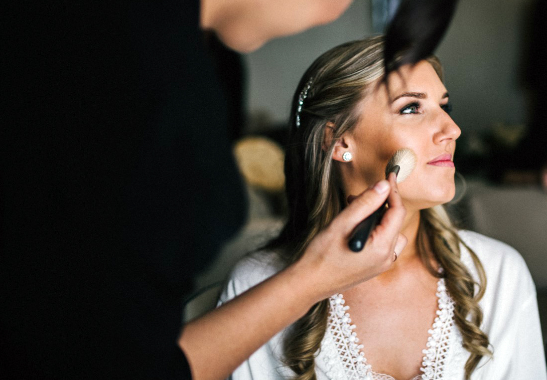 professional makeup artist to prepare for engagement photo shoot