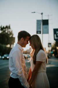 romantic engagement photo of engaged couple on Melrose Ave in Los Angeles California